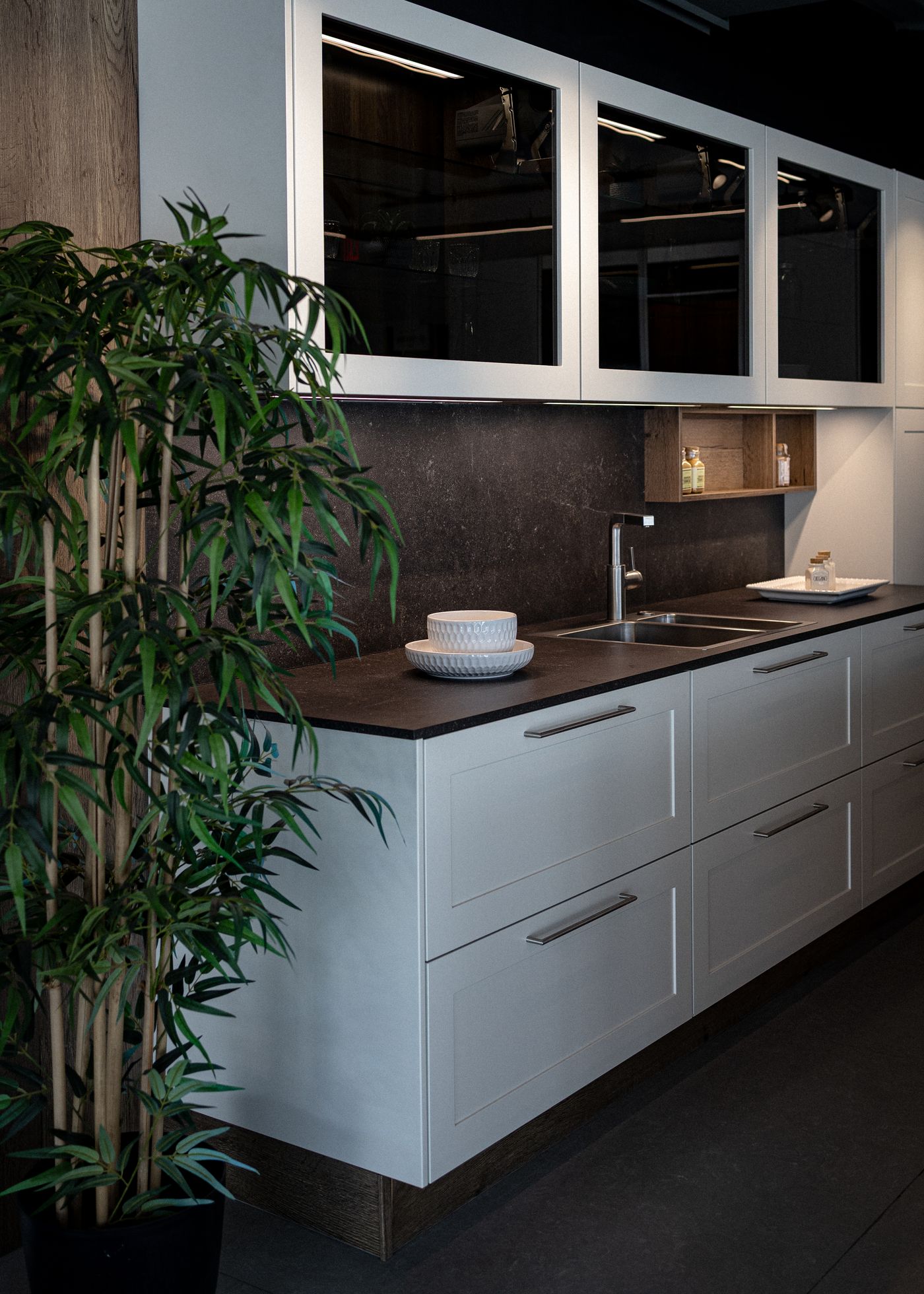 Minimal white kitchen with wood accents