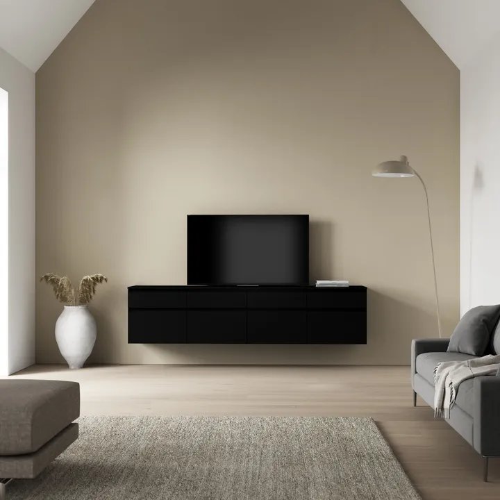 Floating black media lowboard with wall-mounted TV in a modern living room